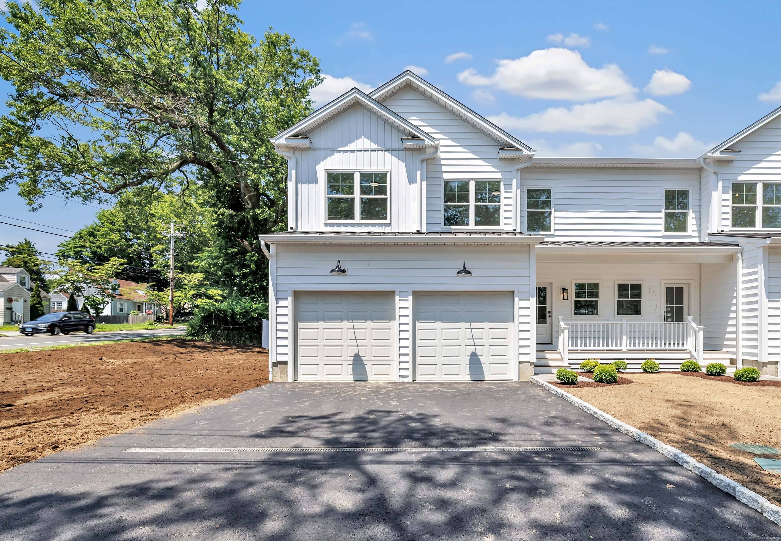 Welcome to this stunning, newly constructed duplex style residence where contemporary design and thoughtful details create a truly elevated living experience.