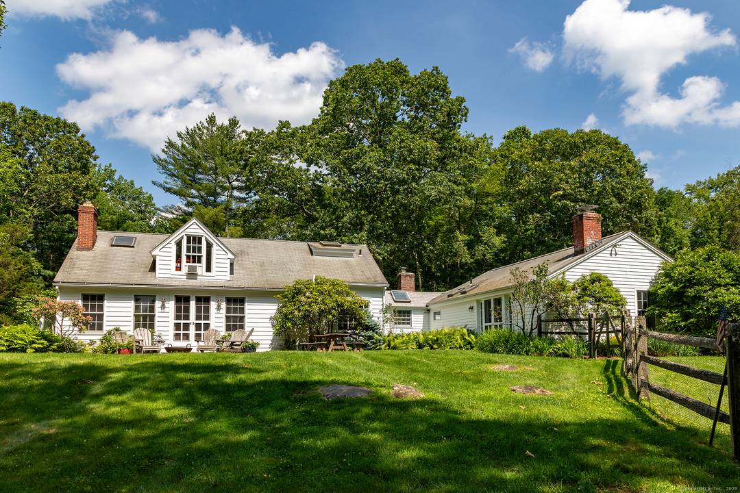 Experience the ultimate country retreat with this charming, fully furnished 3 bedroom, 3 bathroom cottage set on 13 private acres.