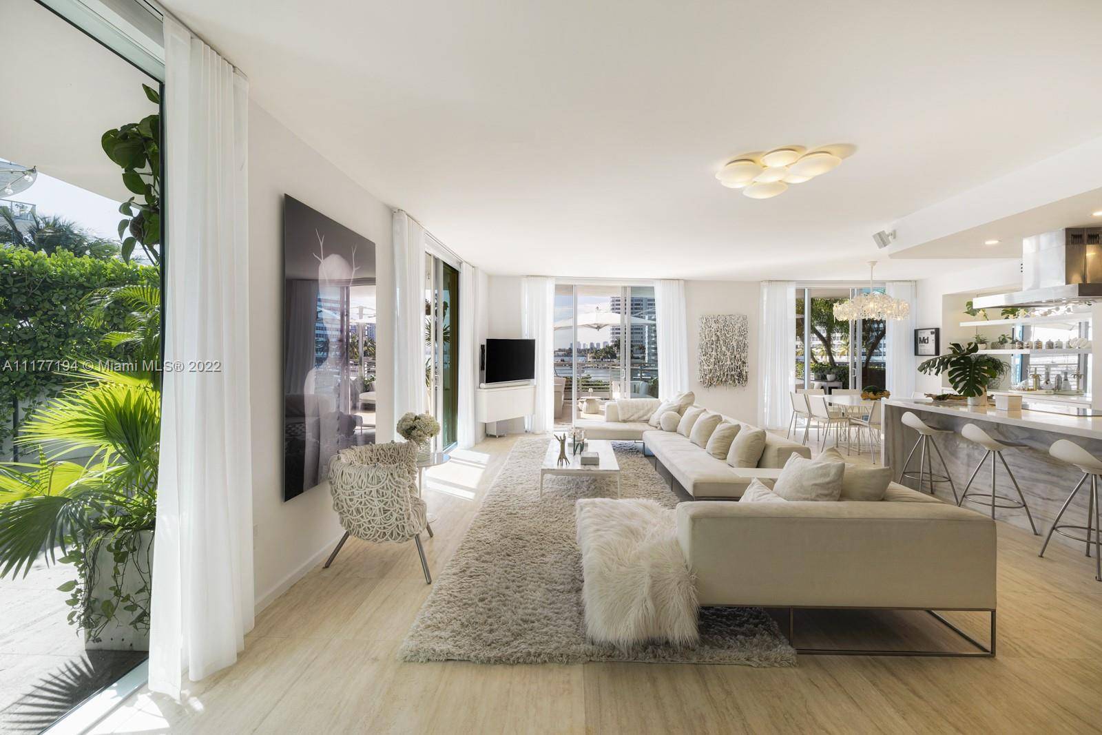 160 feet of direct Biscayne sweeping bay views, walls of glass, and contemporary designs define this exquisitely crafted sanctuary, which beautifully draws the outdoors in.