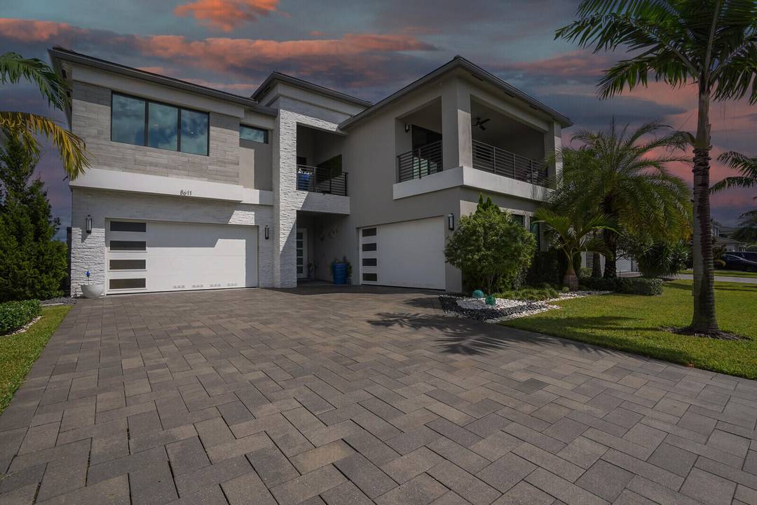 STUNNING MALDIVES MODEL W OVER 700, 000 IN UPGRADES HAS BEAUTIFUL LAKE VIEWS ON A PRIVATE LOT W CUSTOM HEATED POOL SPA !