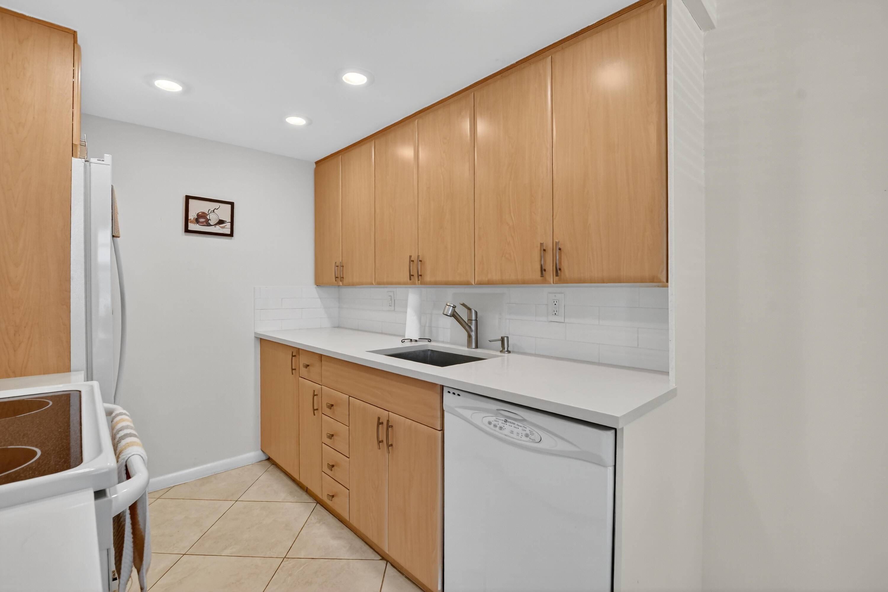 FROM THE MINUTE YOU WALK IN YOU WILL FEEL THE GOOD VIBES THIS CONDO GIVES.