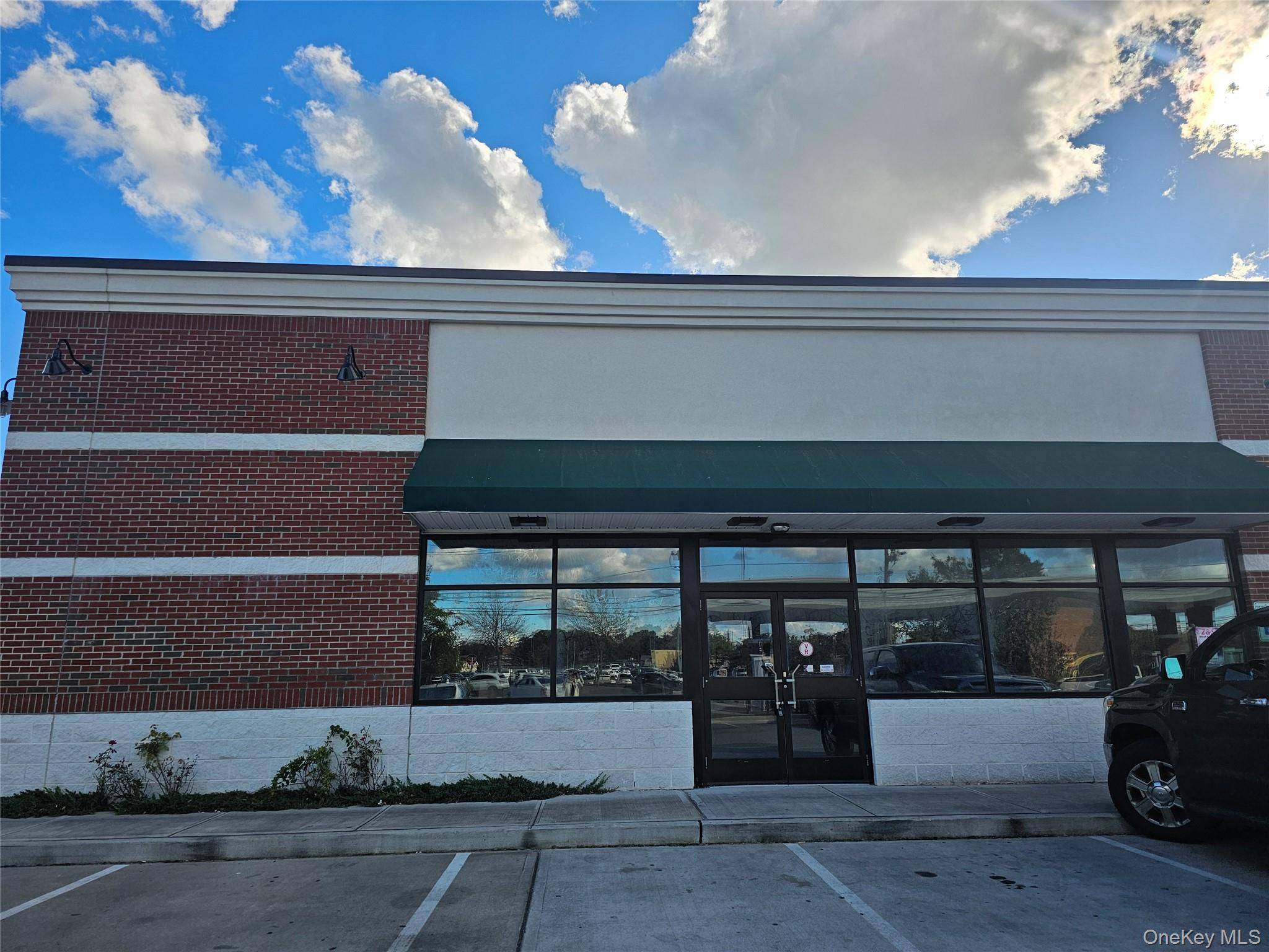 Newly Built and Never Occupied 3, 000 Square Foot Retail Office Space Adjoining the Busy 7 11 Store on the Southeast Corner of Union Boulevard and Saxon Avenue with Curb ...