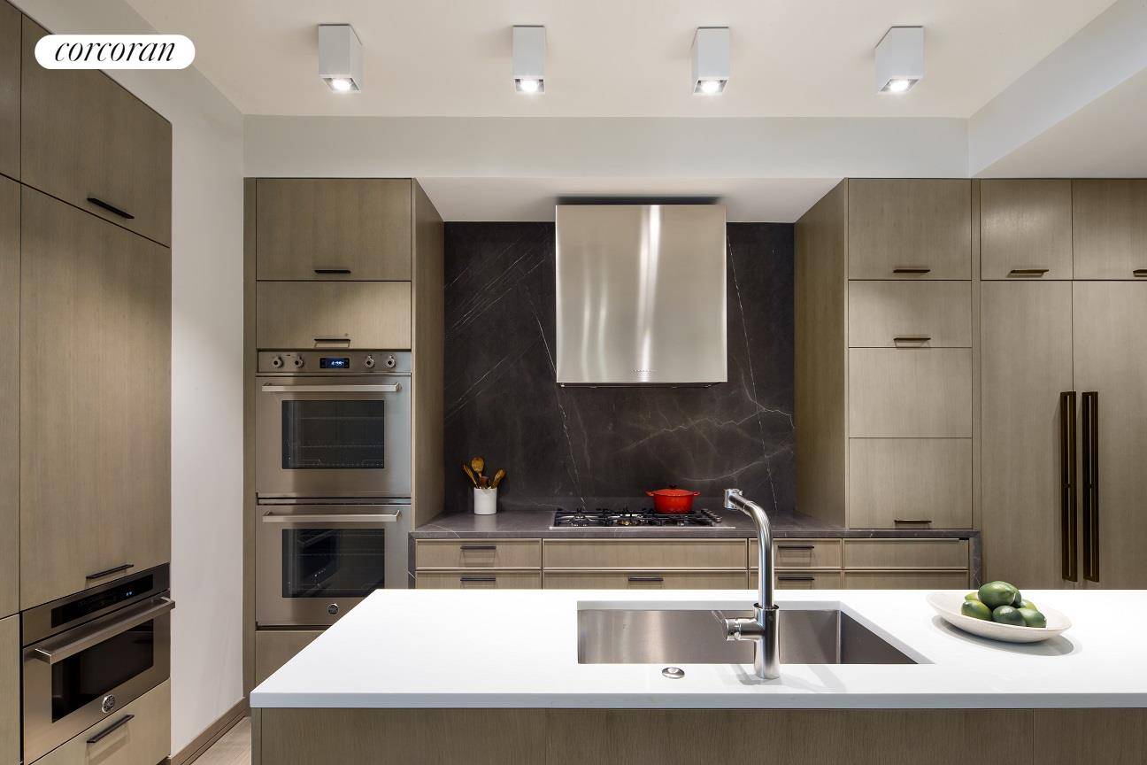 IMMEDIATE OCCUPANCY ! This three bedroom residence with three baths features 10' ceilings and oversized windows with eastern exposure.