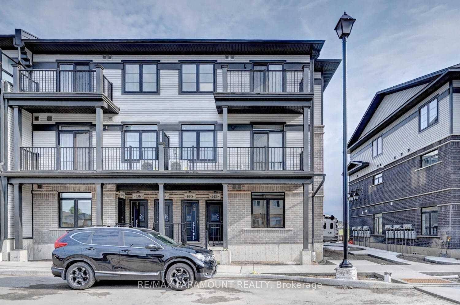 End Unit Urban Town Offers Spacious Layout On The Same Floor.