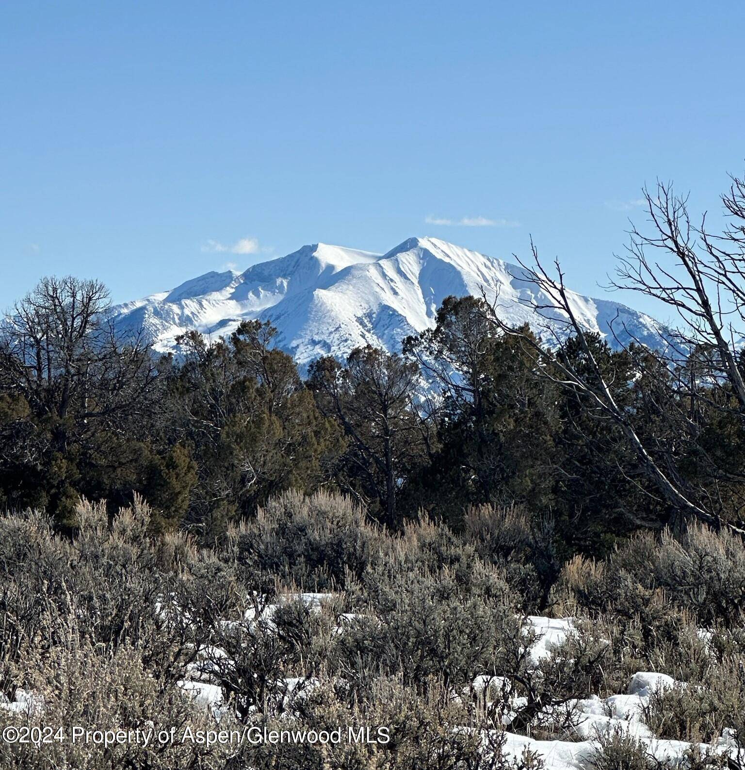 Nestled on a tranquil cul de sac within the exclusive gated community of Elk Springs, this stunning 2 acre lot offers breathtaking views of Mount Sopris and the Elk Mountain ...