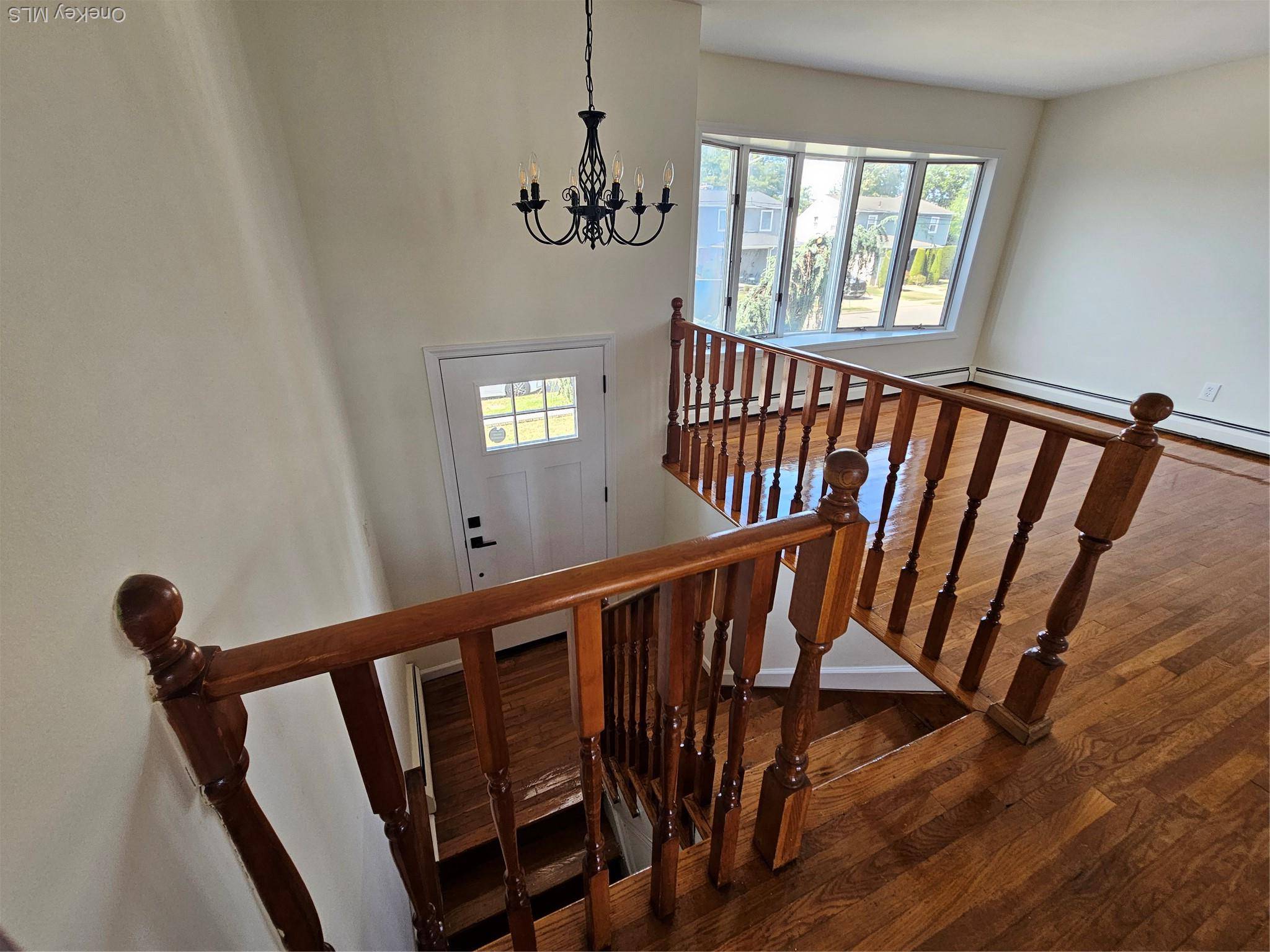 Immaculate renovated top floor hi ranch.