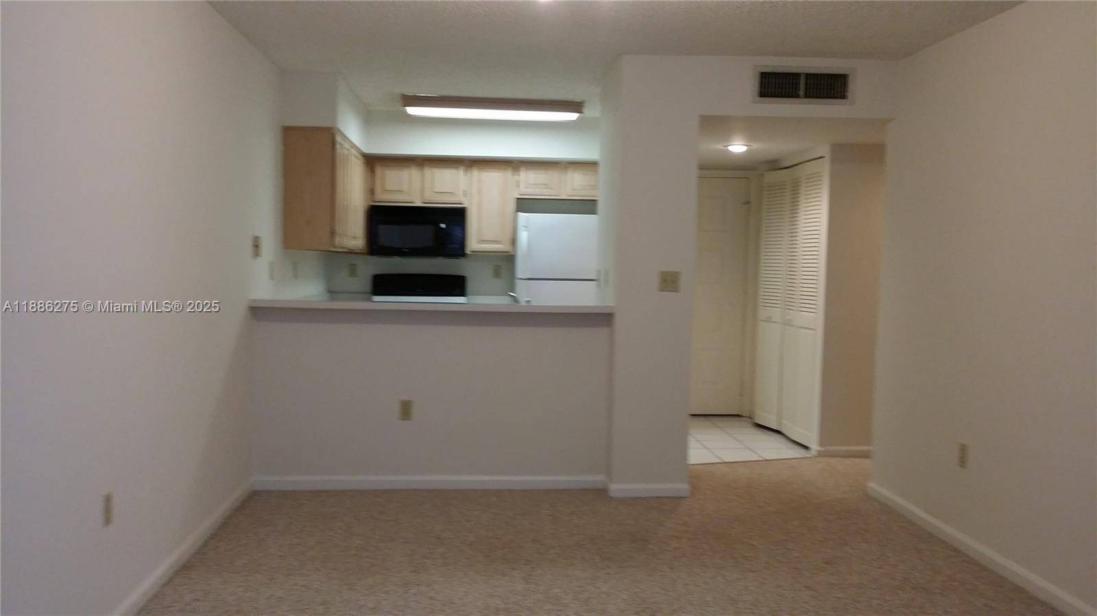 University Inn 2 Bed 2 Bath Condo with Garage an Assigned Parking Space !
