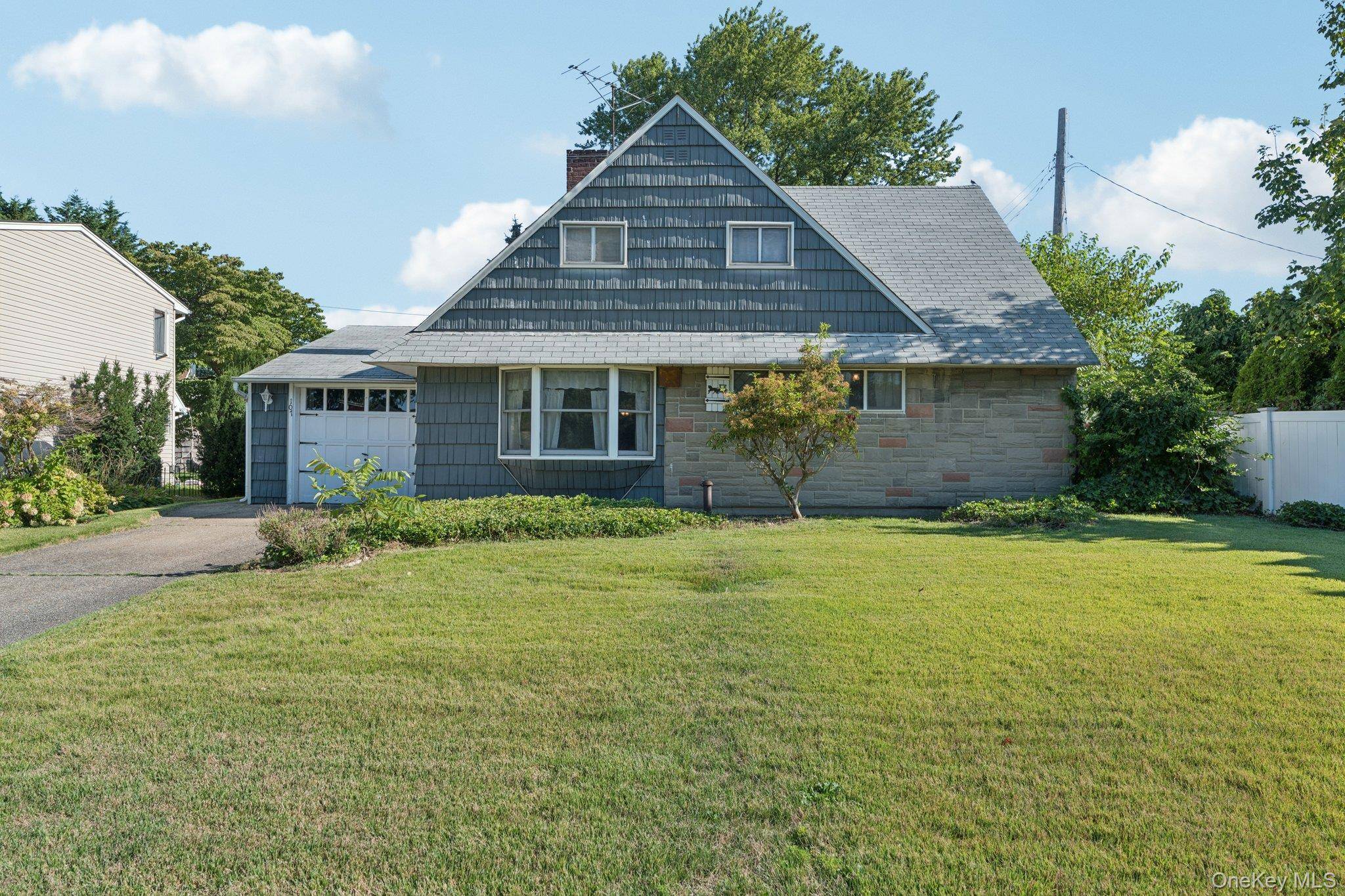 Bring your creativity to this spacious Cape Cod style home featuring 3 generously sized bedrooms and 2 full bathrooms.