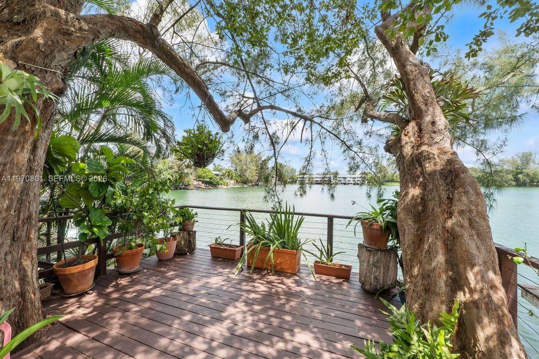 Enjoy unbelievable water views from your own private deck in this serene, nature focused community of Lakeridge a hidden gem townhome community in unincorporated Miami Dade, close to South Miami, ...