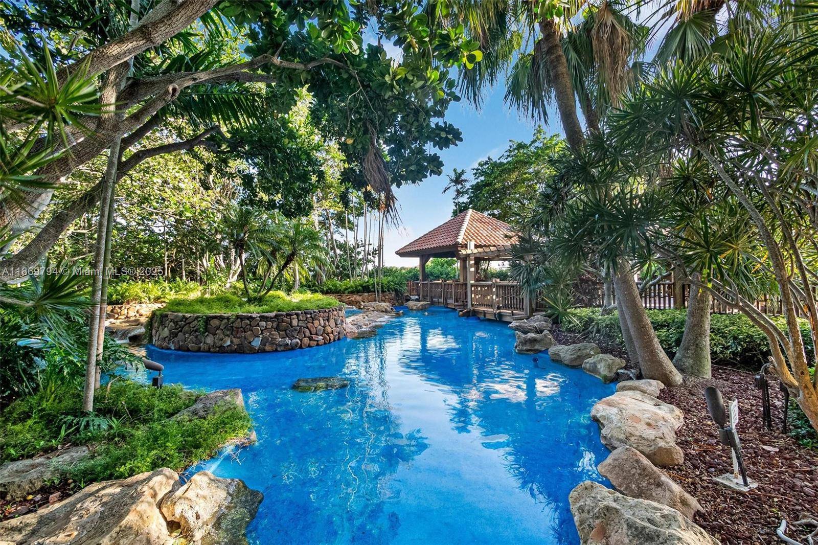 Rare corner unit on the 4th floor, thoughtfully converted into 3 bedrooms and 2 bathrooms, offering serene garden views with lush greenery, ponds, and soothing fountains.