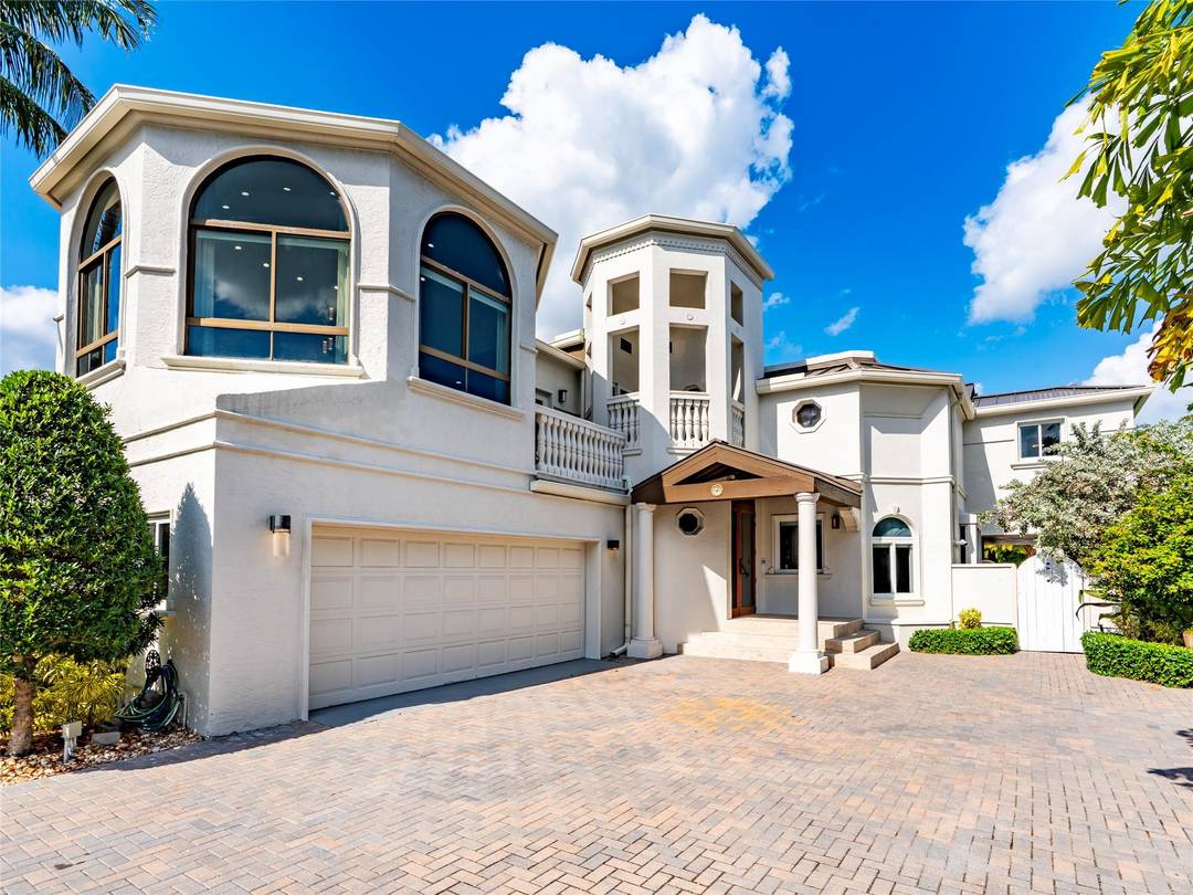 Iconic gated waterfront estate just three homes from the Intracoastal.
