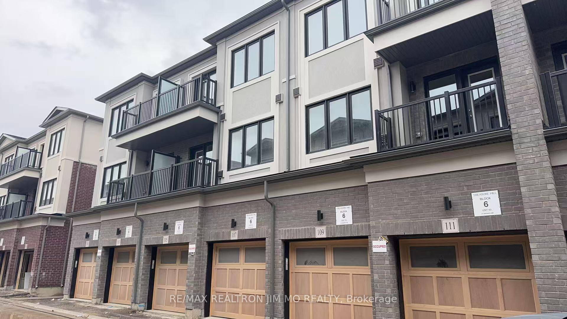 Welcome to this never occupied, design forward townhome in the distinguished Legacy Hill community.