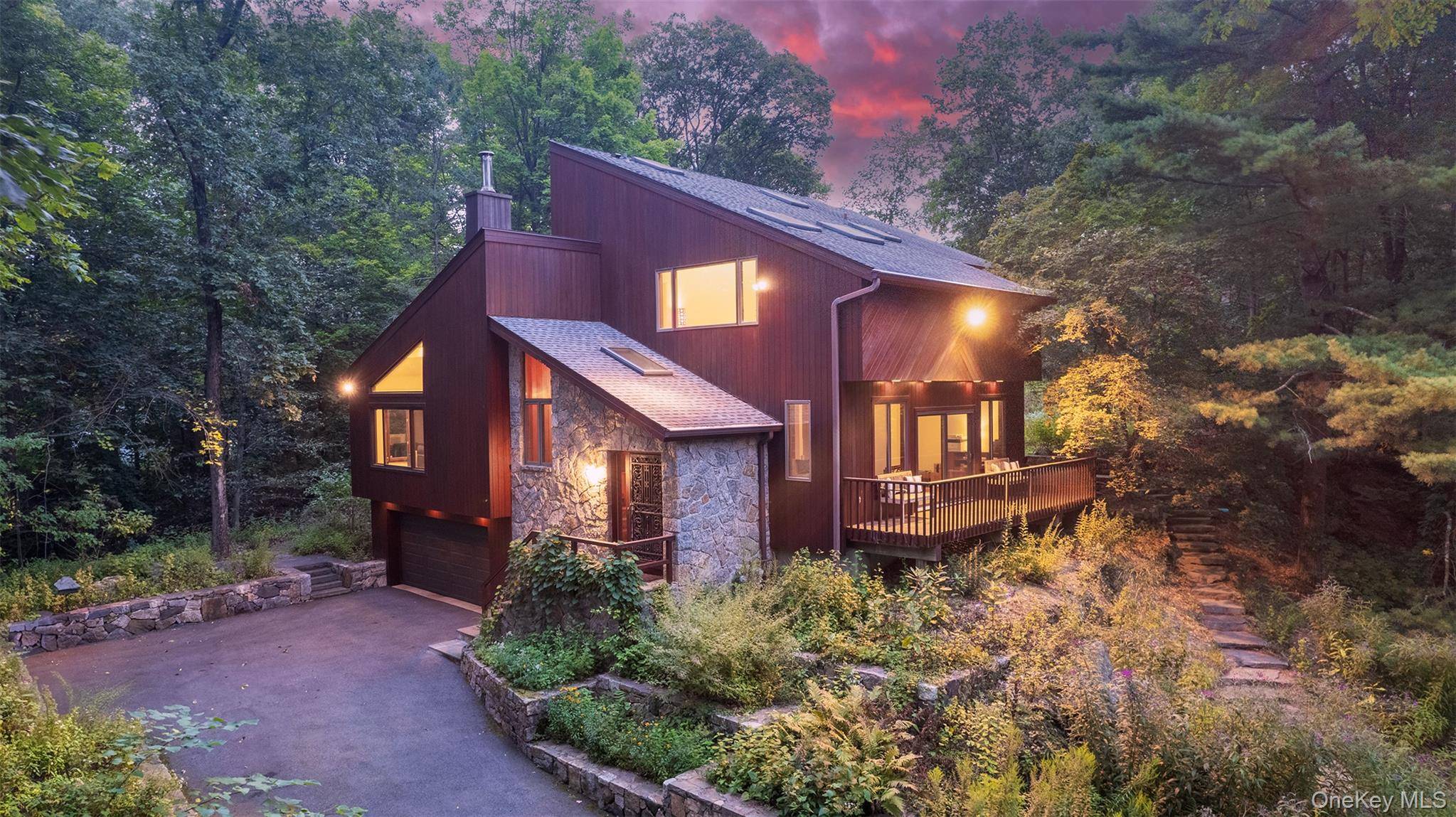 Modern convenience meets the tranquility of nature in this mid century inspired retreat.
