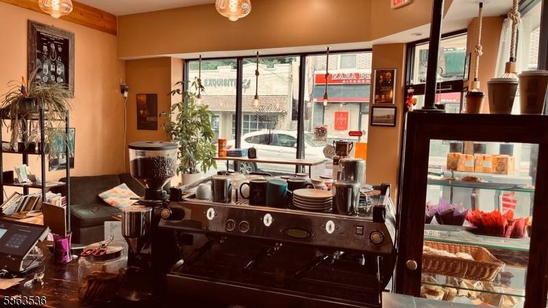 Excellent business location on corner of Main St and Washington St, the heart of West Orange downtown district.