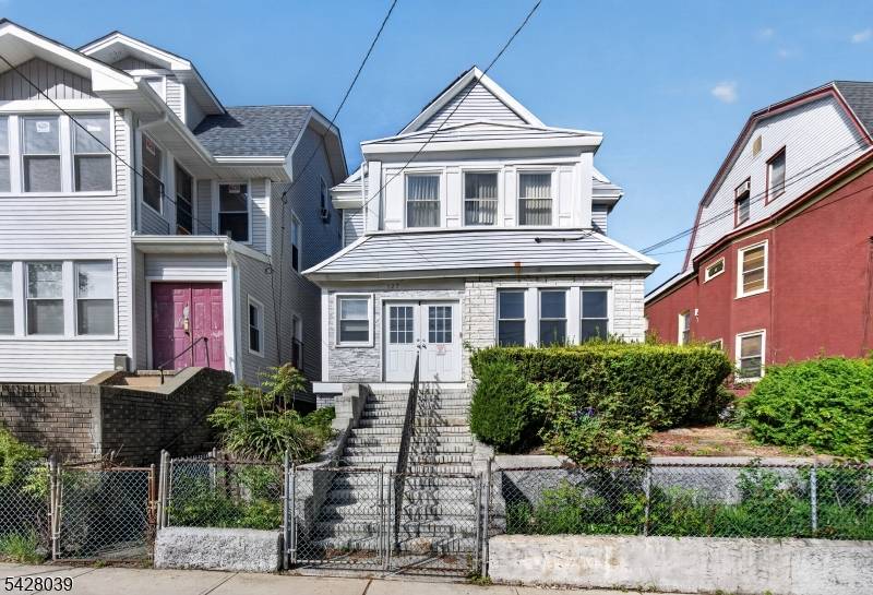 Spacious 7 bedroom, 2. 5 bath home situated on a large lot in Newark.