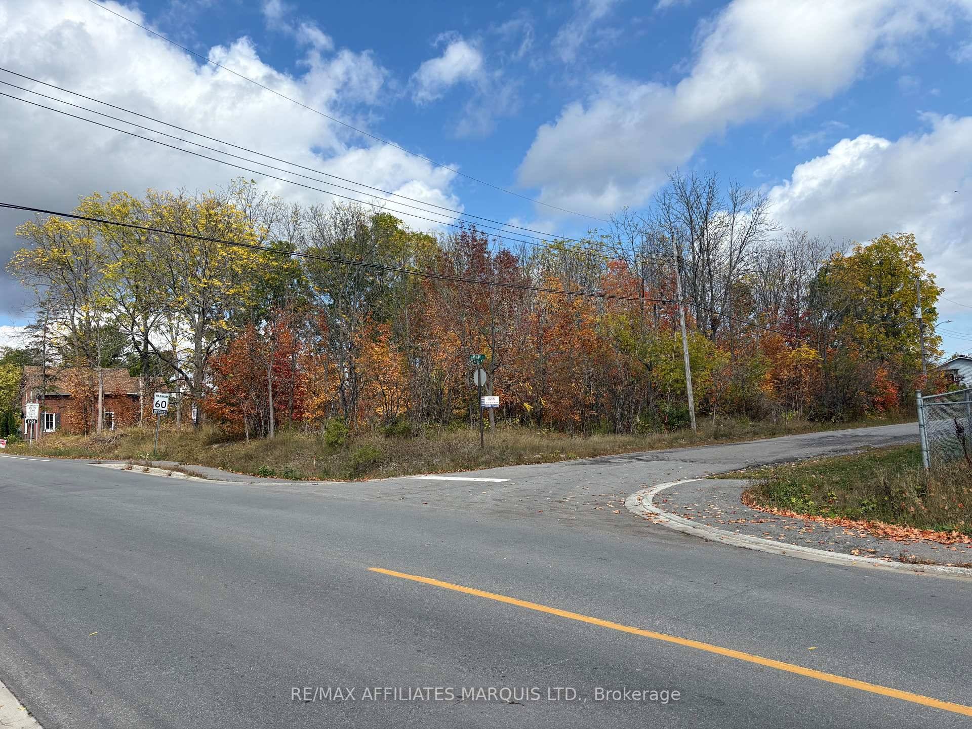The site is a 3 4 acre residential building lot that is zoned R 2 and is ideally located just a short block from Almonte District High School.