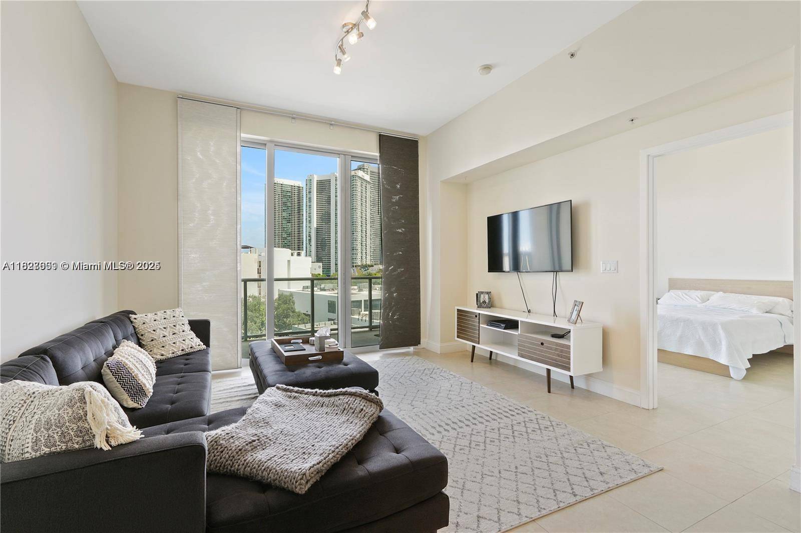 Location ! Step into this stunning residence in vibrant Midtown Miami.