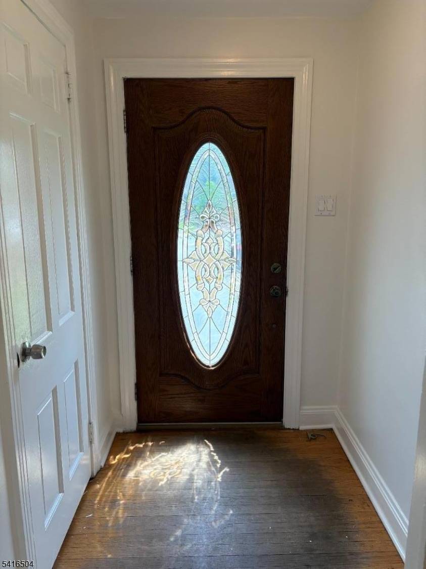 SIDE HALL COLONIAL HOME IN THE HEART OF PLEASANTDALE.