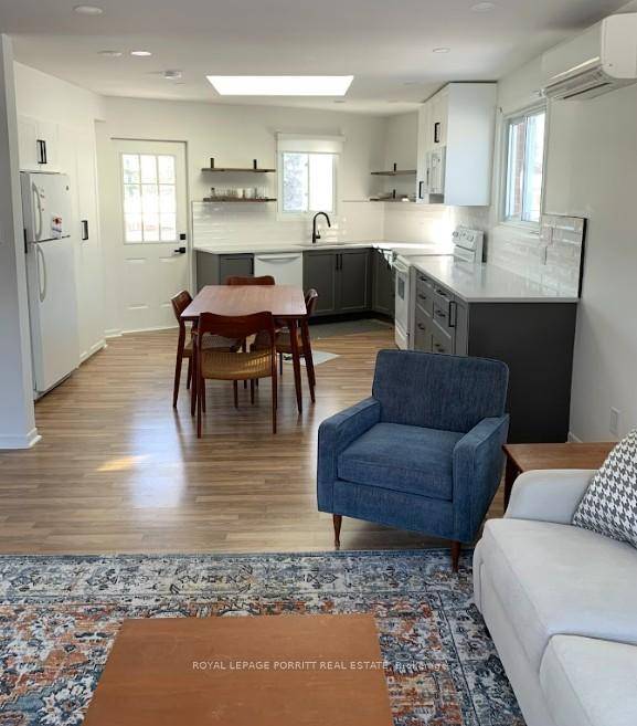 Spacious and sun filled top floor apartment in the heart of Long Branch, offering exceptional space and a highly walkable lakeside lifestyle.