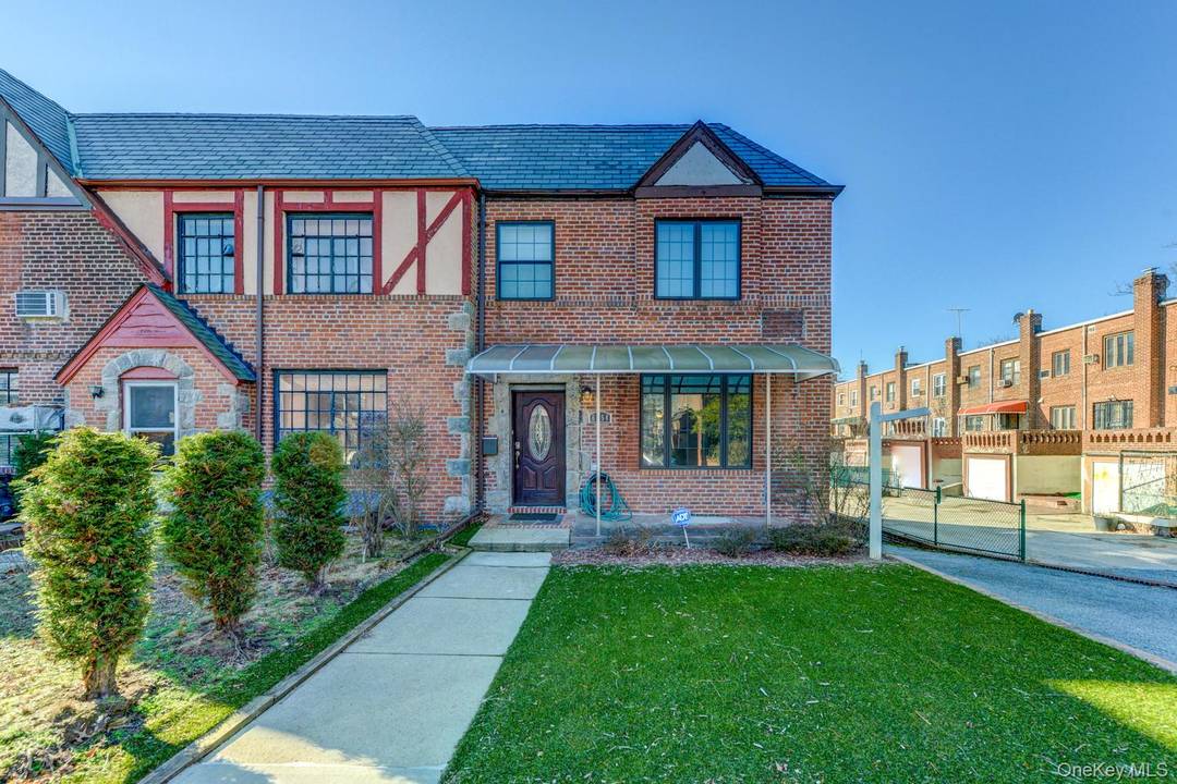 Elegant Forest Hills Tudor with Modern Sophistication Tucked away on a picturesque tree lined street in the heart of Forest Hills, this beautifully renovated brick townhouse offers timeless charm with ...