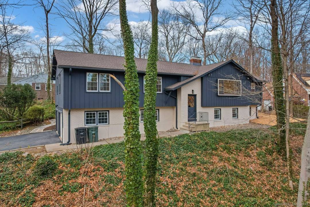 Oversized Raised Ranch Completely Remodeled in Forest Heights !