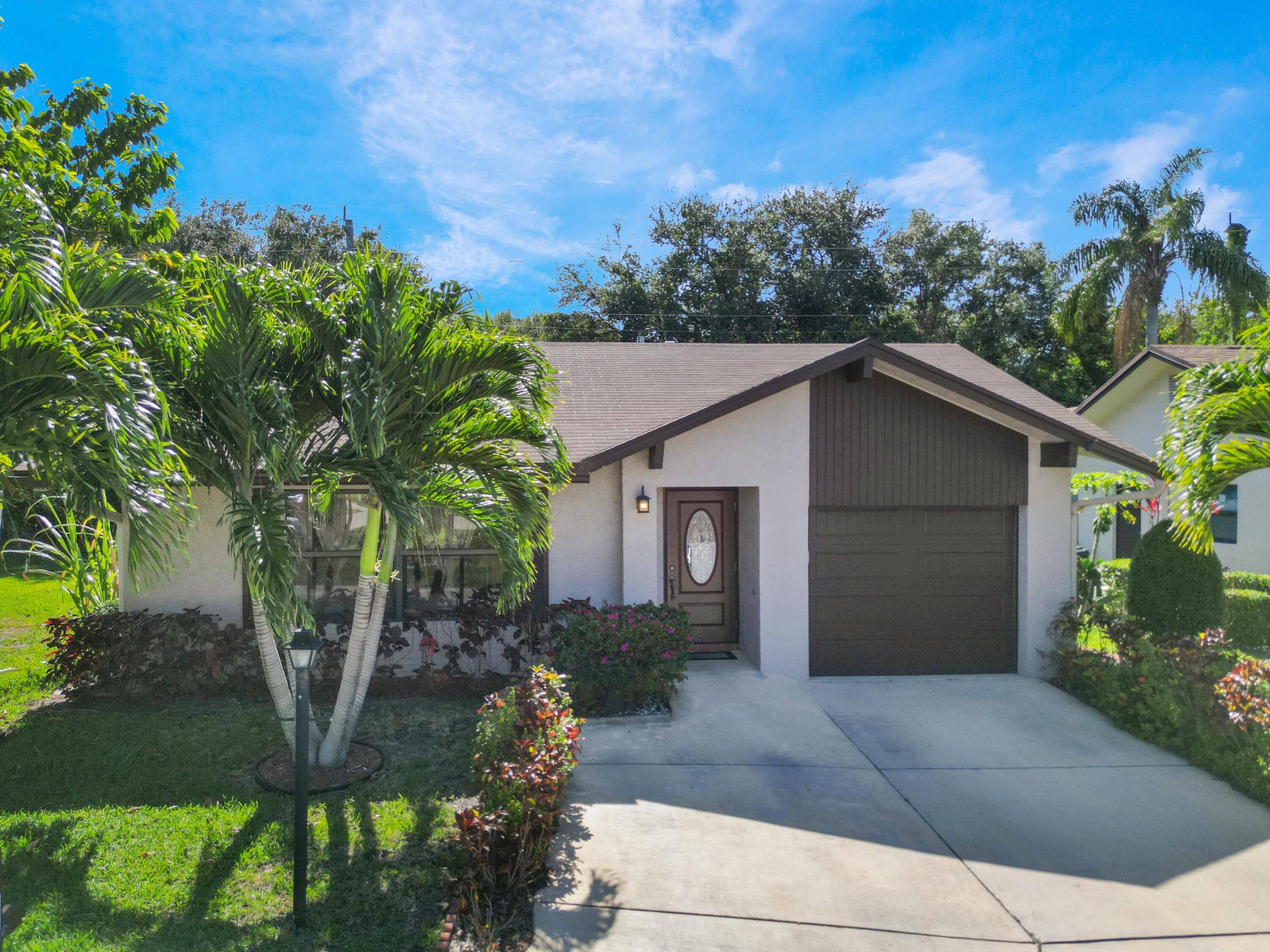 Well Maintained 2 Bedroom, 2 Bathroom Single Family Home with Impact Windows and low HOA All for Under 300K !
