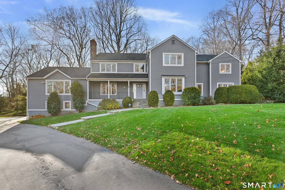 Welcome to 84 Delaware Road, a thoughtfully expanded colonial with timeless style and modern comfort.