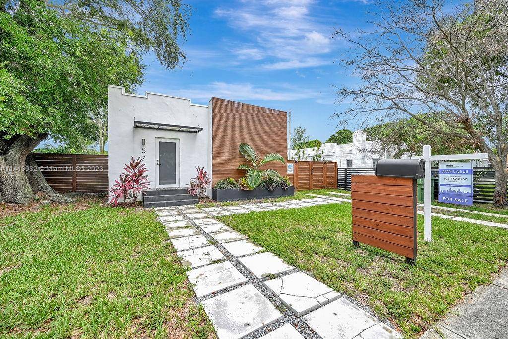 Stunning and modern fully remodeled home with three bedrooms, two bathrooms, and a guest unit.