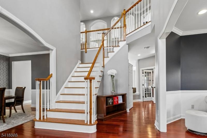 Elegant 4 5 bedroom home with stunning curb appeal, soaring two story foyer, and dramatic great room, centrally located in New Jersey with convenient access to multiple hospitals, universities, major ...