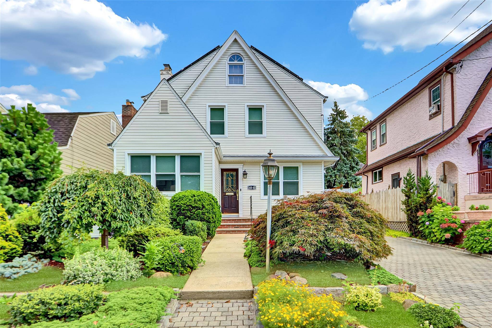 Welcome to a spacious beautifully maintained and move in ready 5 bedroom home nestled in the heart of Little Neck.