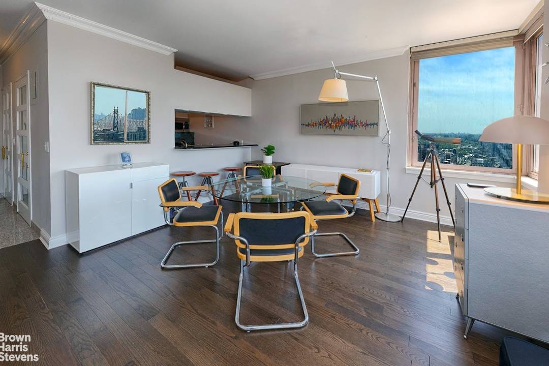 Sunlit 1Br 2bth with dining in Sky High UES Condo Now priced to sell !