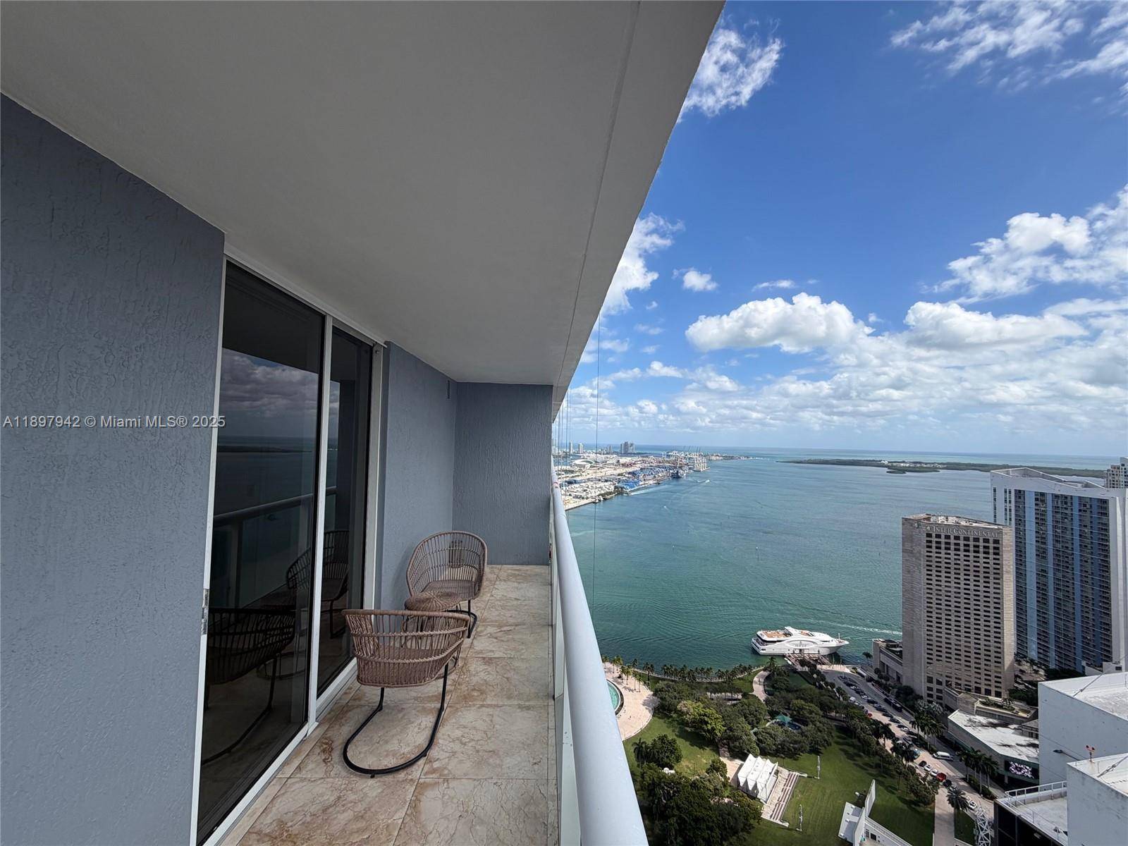 Great opportunity on the 52nd floor SW corner 2bed 2bath unit spacious wraparound balcony with amazing Bay views to Biscayne Bay and Downtown Miami.