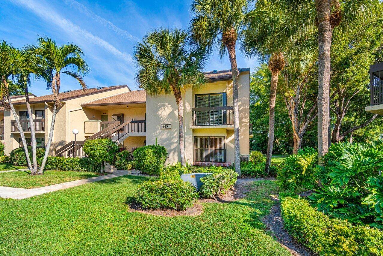 REDUCED Lake Views from this1st Floor Corner Garden Condo on the 12th Hole The Bee Hive across the lake makes our honey that we sell in the cafe Up Dated ...