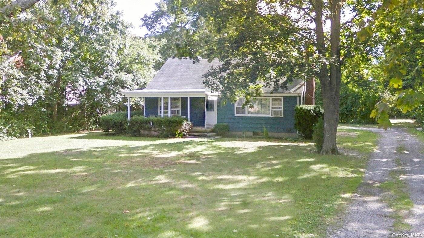 large cape south of the highway featuring 4 large bedrooms, 2 full baths, living room, Eat in kitchen, full basement and a large yard.