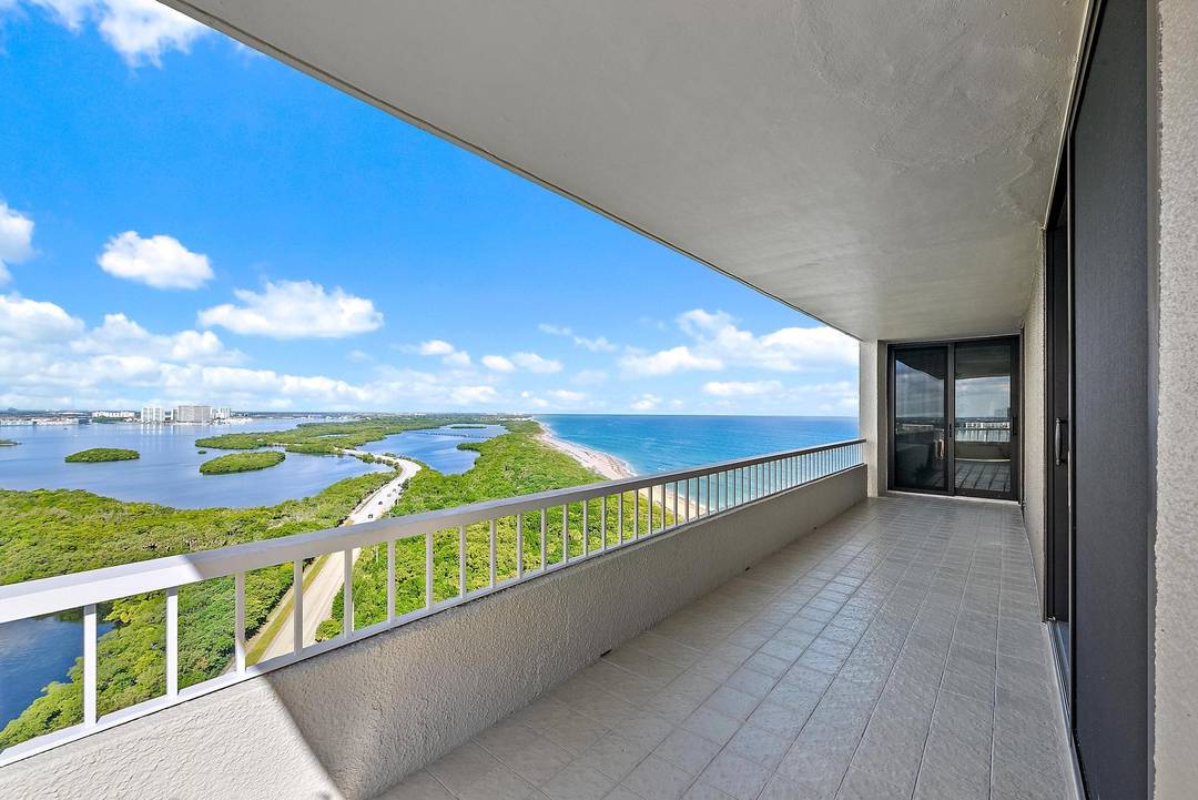 EXPERIENCE THE MOST COVETED VIEW ON SINGER ISLAND WITH TRULY UNOBSTRUCTED PANORAMA OF THE ATLANTIC, BEACHES, AND THE INTRACOASTAL.