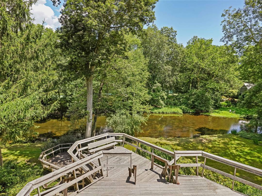 Idyllic riverfront property in Lower Weston a builder's dream with both main house and barn transformations.