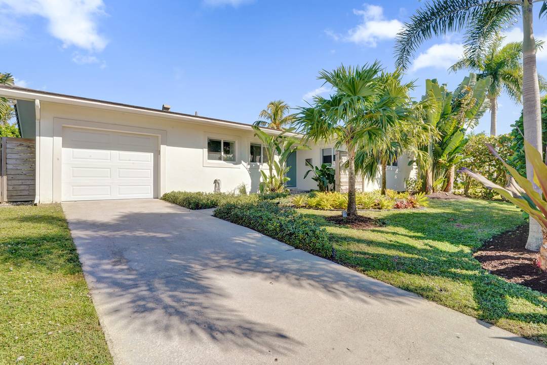 Beautifully furnished seasonal or annual rental in East Boca designers own remodeled midcentury modern home with lush tropical landscaping, lots of light and great energy !