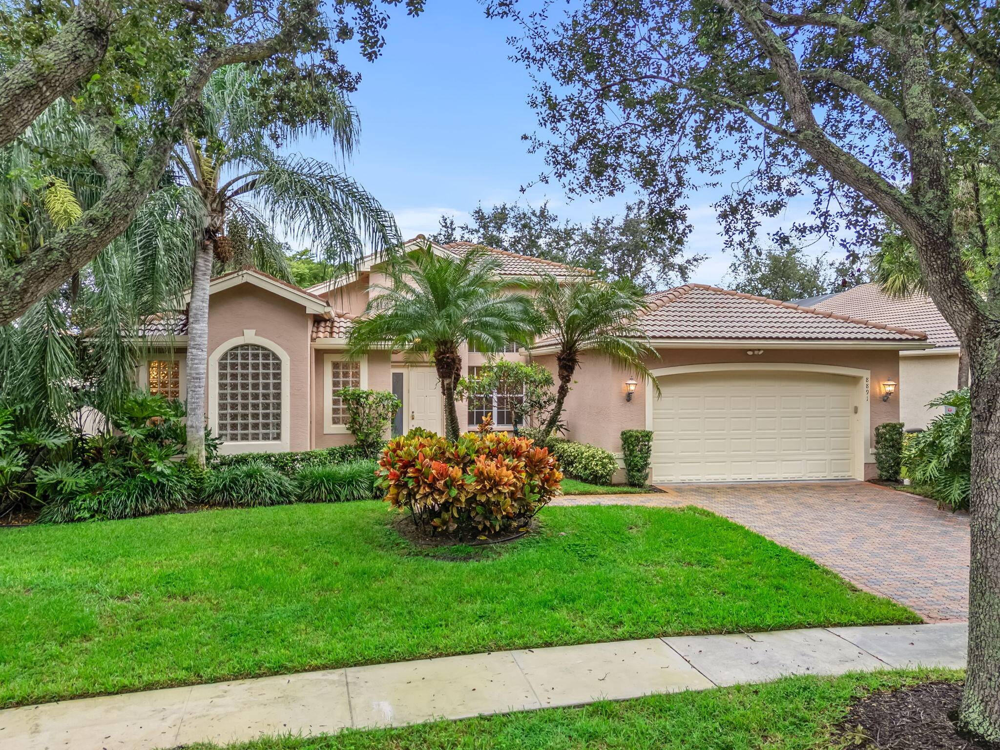 Welcome to 8891 Majorca Bay Drive, a beautifully maintained single family home in the sought after Valencia Shores community of Lake Worth.