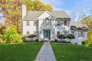 Nestled in the heart of the charming town of Brookfield, 15 GreenKnoll Dr.
