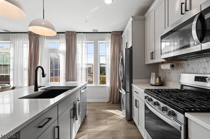 Located in the sought after LINK at Wesmont community in Wood Ridge.