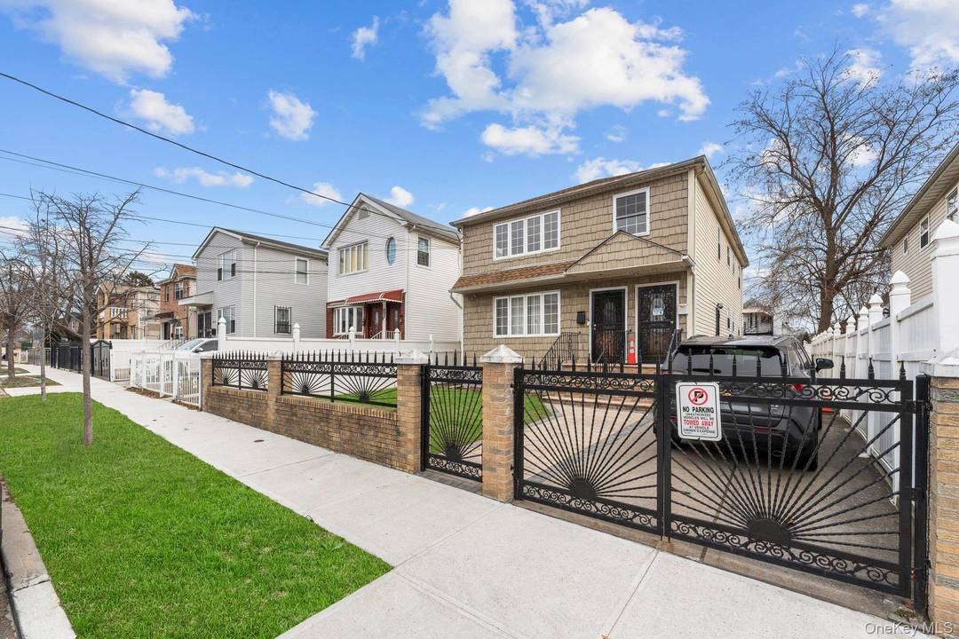 Discover this triple mint two family gem, perfectly situated on a picturesque, tree lined street at the border of Springfield Gardens and Rosedale.