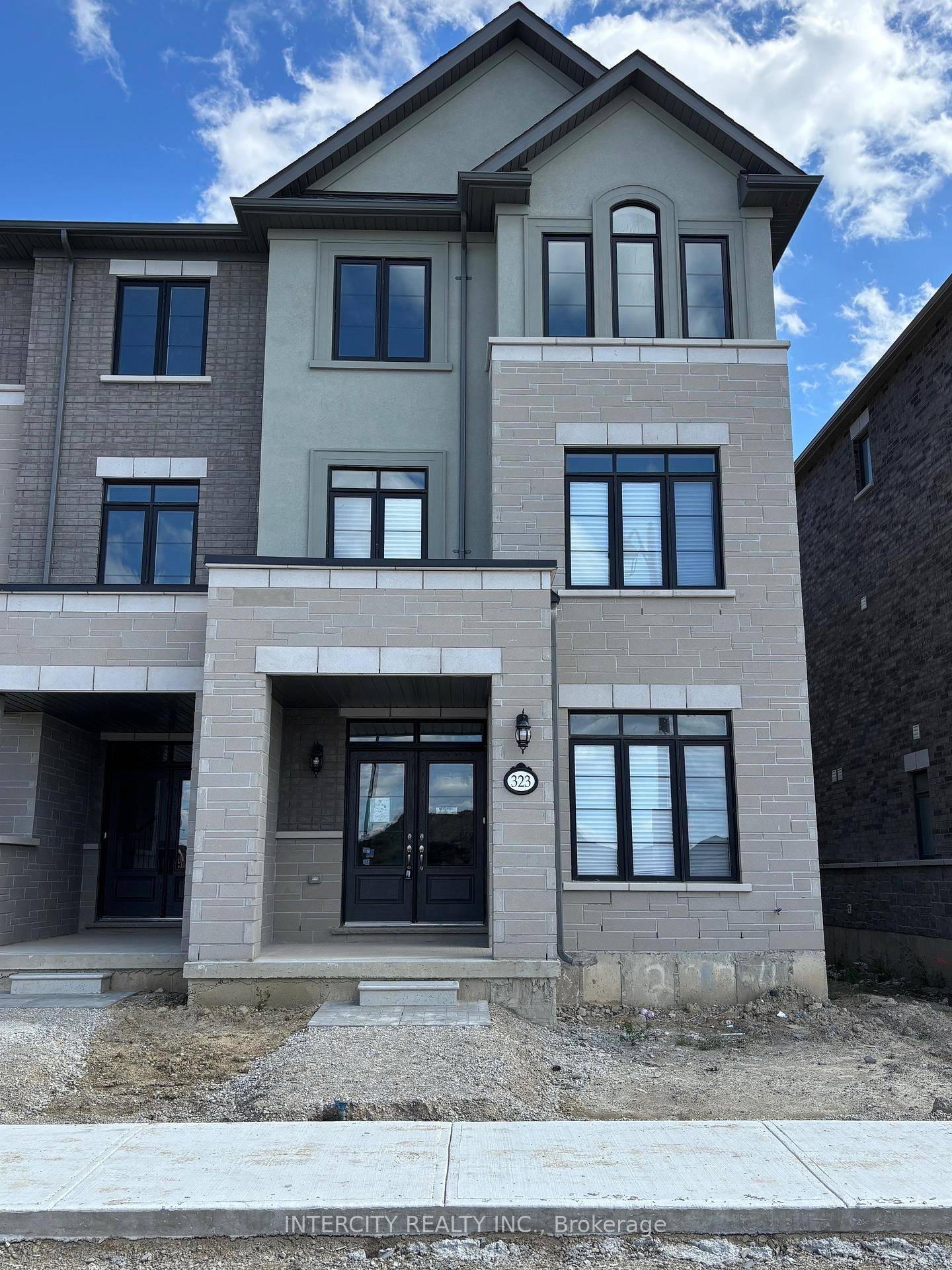 Super Bright 3 Storey End Unit Townhouse in Mayfield Village, Welcome to the Granby Model by renowned Remington Homes a stylish and spacious 2051 sq.