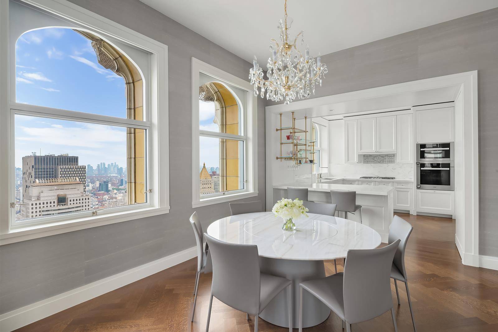 Residence 41B is a light filled retreat wrapped in the storied elegance of the Woolworth Tower.