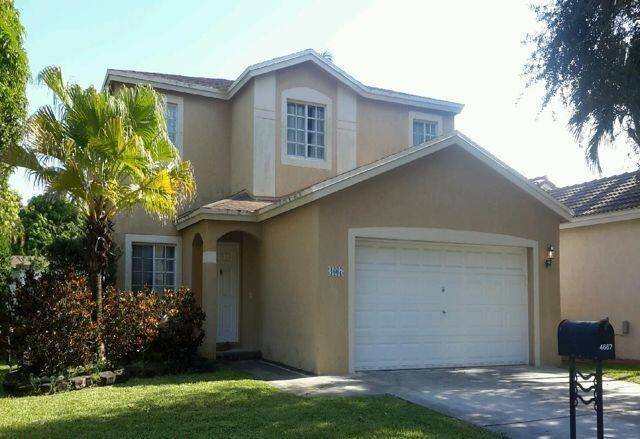 Beautiful updated 4 bedroom, 2 1 2 bath home with a huge backyard with room for a pool.