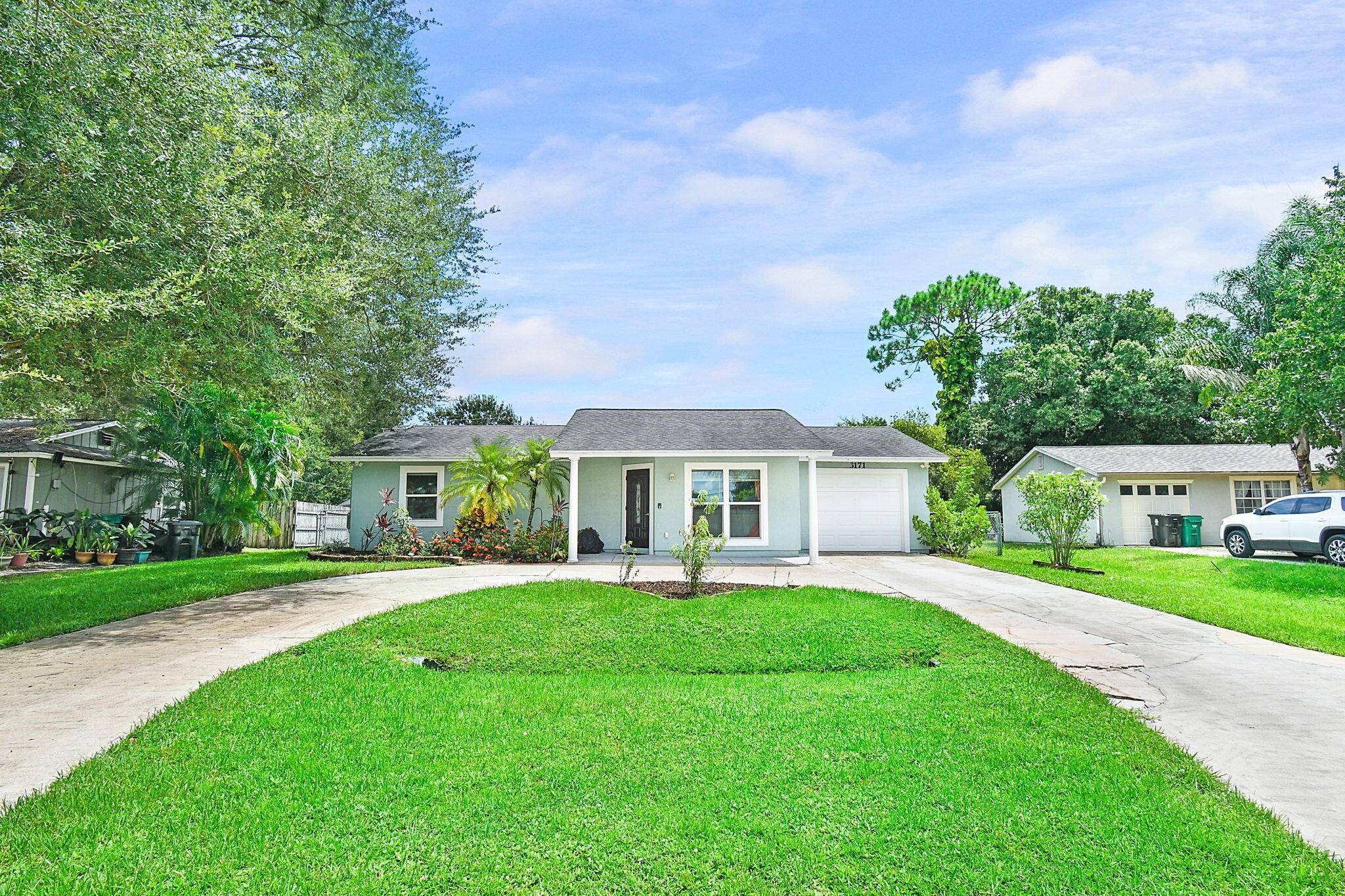 This charming and affordable 2 bed 2 bath FULLY SOLAR POWERED home is move in ready and nestled in a fantastic neighborhood with no HOA !