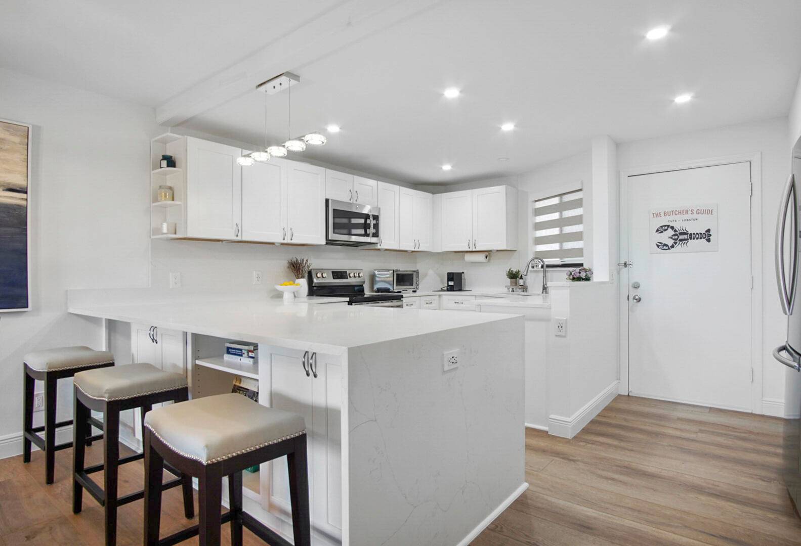 Welcome to this breathtaking 2 bedroom 2 bathroom property with serene pond views just steps away from the beach and the sparkling Atlantic ocean !