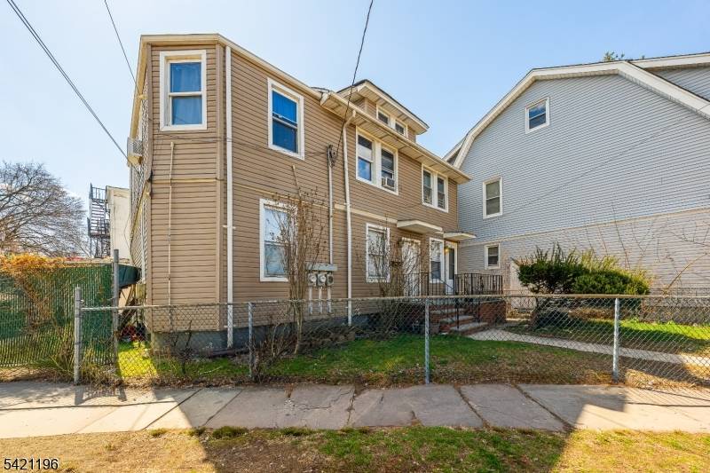 Sold strictly as is, this home serves as a high value opportunity to build immediate sweat equity in a prime location.