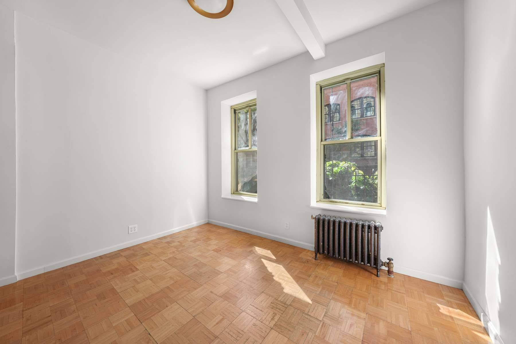 Arrive to this gracious second floor one bedroom, tucked along a quiet, tree lined street in the heart of Noho.
