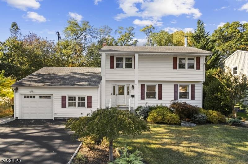 Welcome to 14 Mayling Court, a beautifully updated Colonial in one of Edison's most desirable neighborhoods.