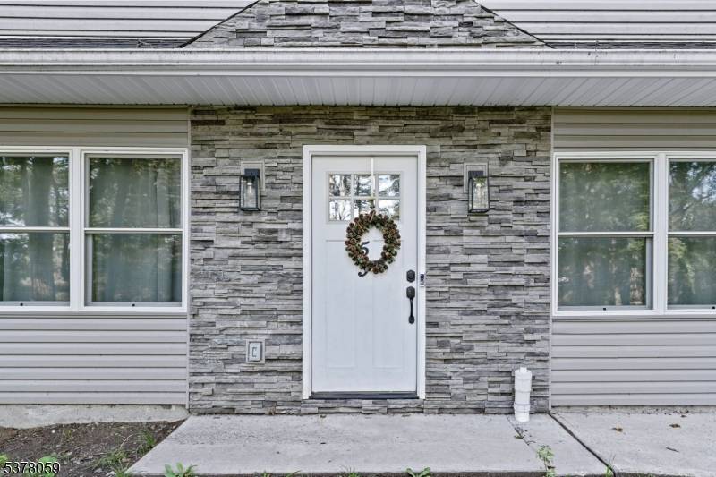 Welcome to this beautiful newer construction in peaceful Hewitt, NJ near Upper Greenwood Lake.